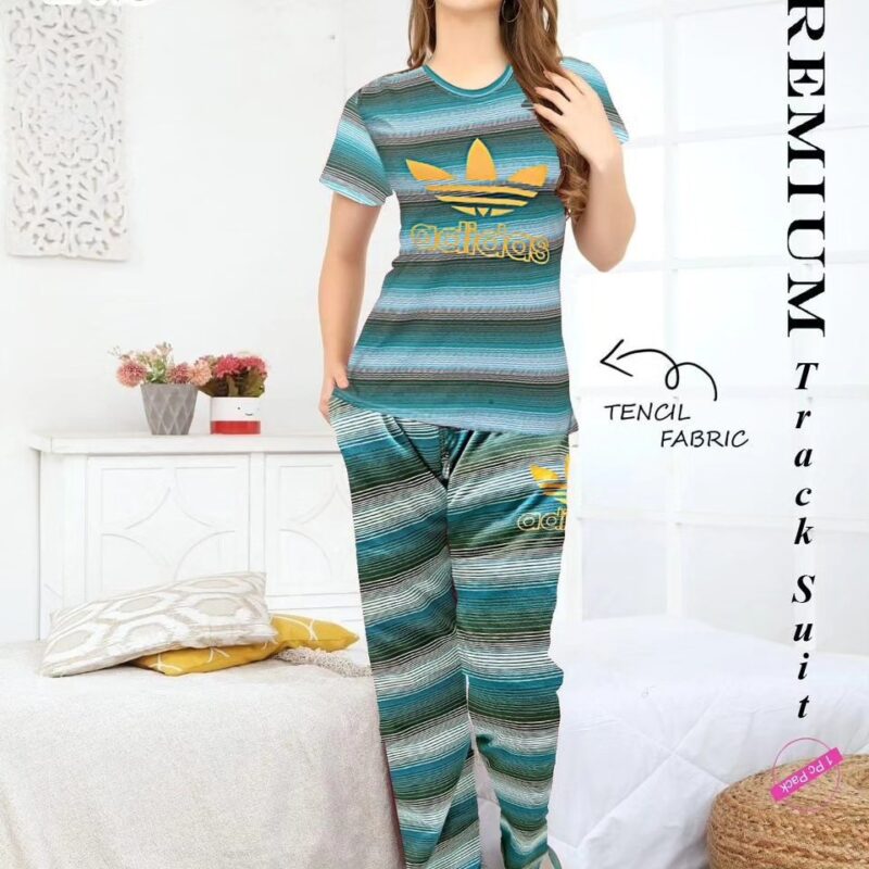 ladies adidas tencil track suit